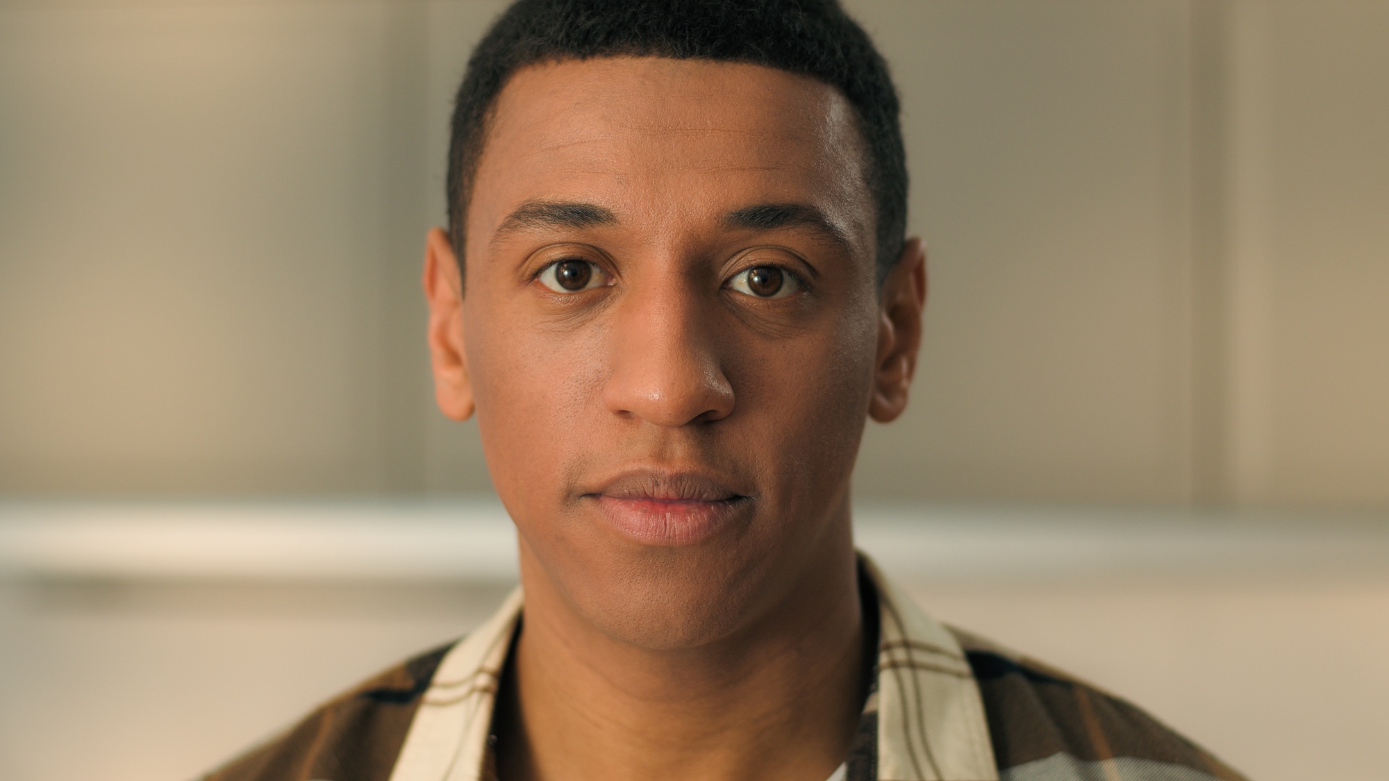 African American man guy 30s millennial single homeowner serious calm looking at camera home weekend